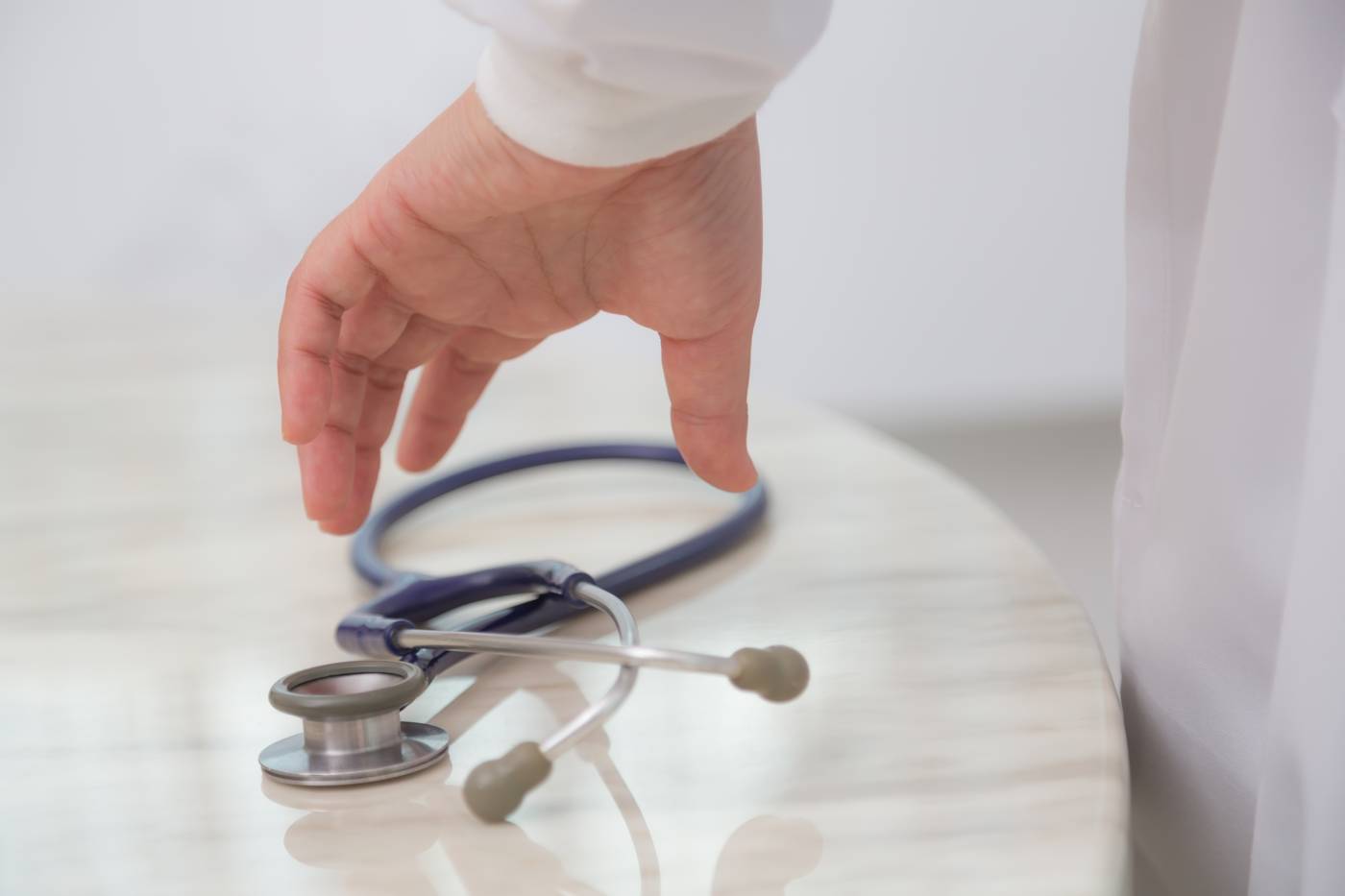 Physician with stethoscope during home hospitalization